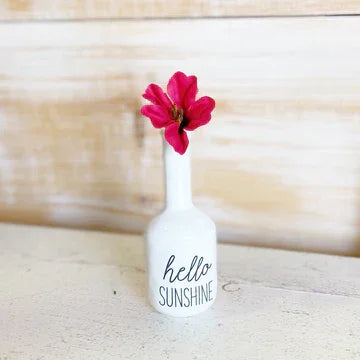 White vase with hello sunshine text and pink flower in Shop Daisy’s Ceramic Bud Vases Basket