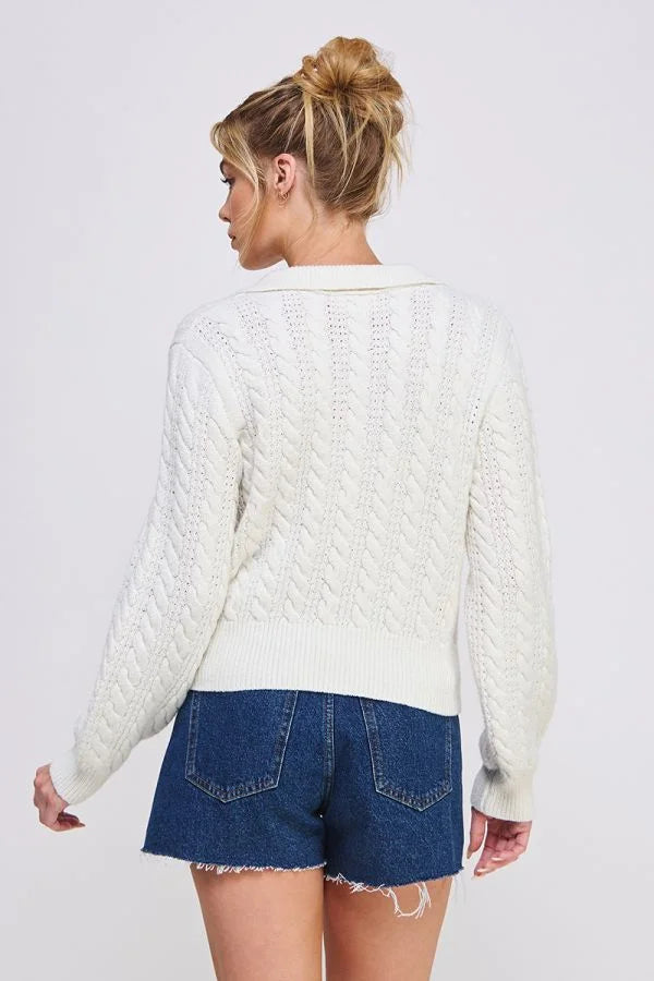 White soft cable knit Johnny collar pullover sweater paired with denim shorts