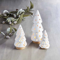 White ceramic Christmas tree lantern with glowing cutouts, Triangle Christmas Tree design