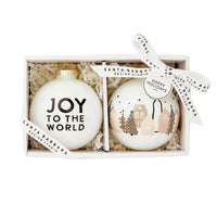 White glass Christmas ornaments set with Joy to the World house design