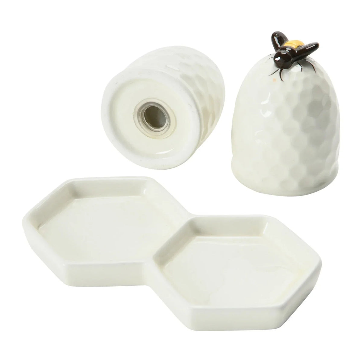 White ceramic honeycomb plate with BEE BEEHIVE salt and pepper shakers and honey pot