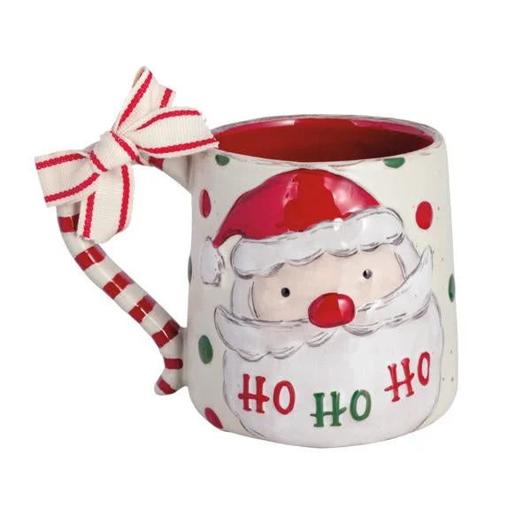 White ceramic Christmas Santa Bow Mug with candy cane handle and red interior