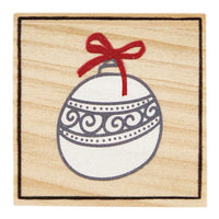Elegant white Christmas ornament with swirls and a red bow, enhancing snowflake shaped earrings