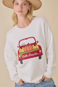 White crew neck long-sleeve sweatshirt with pumpkin truck embroidered patchwork graphic