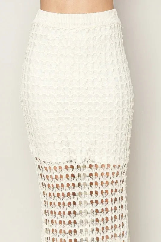 White crochet maxi skirt with sheer lattice pattern for a flowy boho vibe