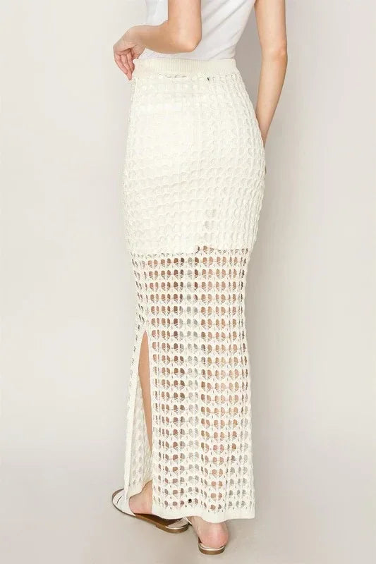 White crochet maxi skirt with side slit and lattice pattern for a boho, free spirit look