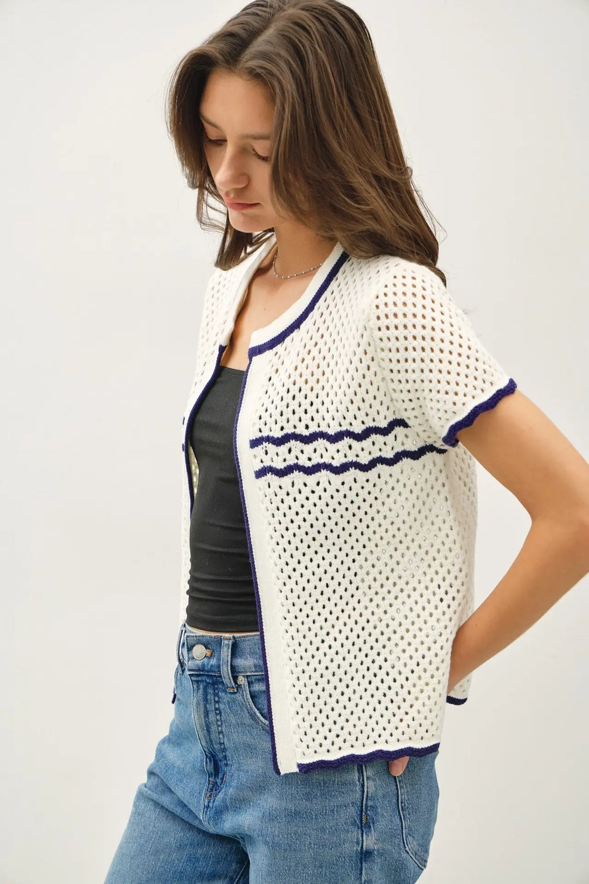 White crochet knit open cardigan with navy trim, perfect for women’s boho clothes