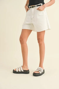 White washed denim shorts with a stylish belt for a fashionable summer look