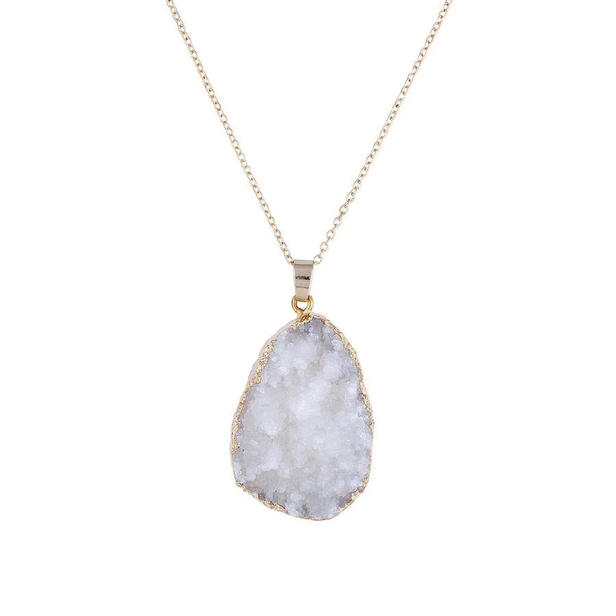 White quartz genuine stone pendant on a gold chain, elegant jewelry piece