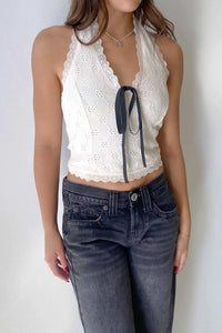 White lace trim eyelet halter top with black ribbon tie for stylish summer wear
