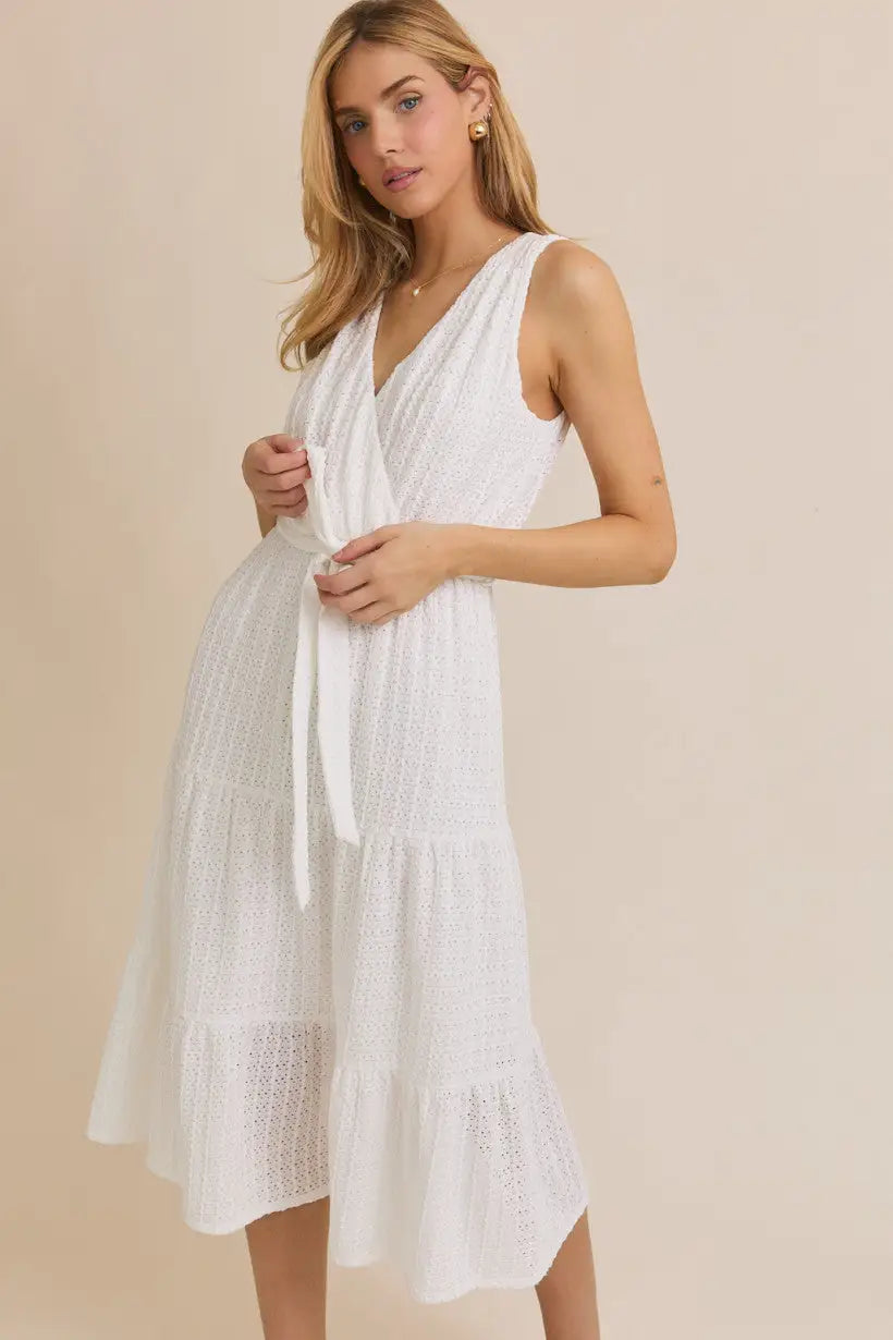 White eyelet midi dress with surplice sleeveless waist and waist tie detail