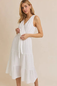 White eyelet midi dress with surplice sleeveless waist and waist tie detail