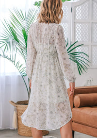 White floral print long sleeve midi dress with elasticized waist, perfect for stylish occasions