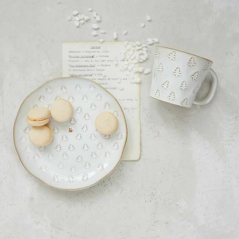 White and gold macaron plate on debossed stoneware Christmas plate with patterned design