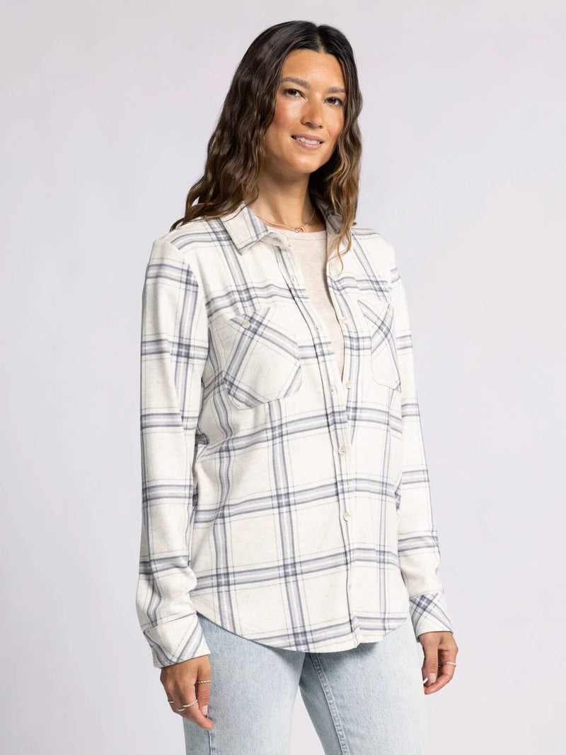 White and gray plaid collared button top with long sleeves and front pockets