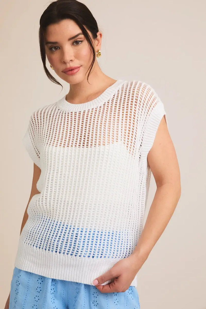 White knit sleeveless top from Shop Daisy, ideal for women’s boho chic clothing