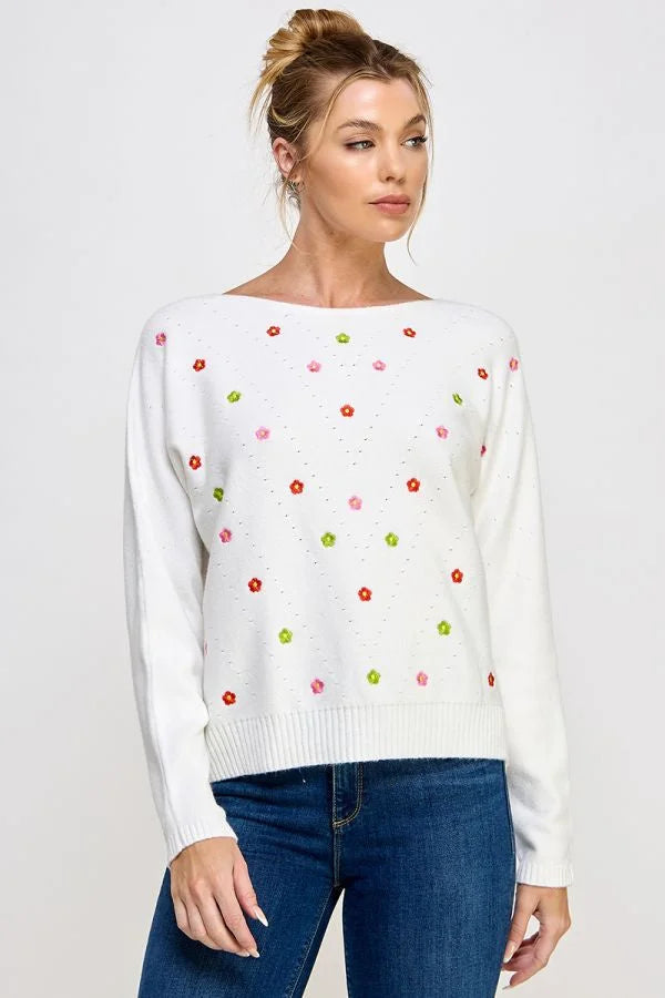 White knit fine gauge sweater with soft daisy embroidered floral pattern