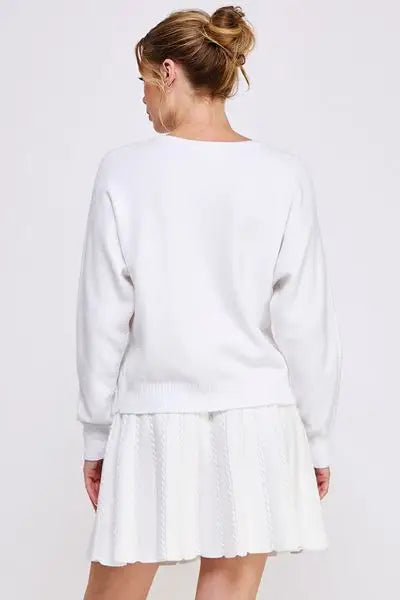 White knit Soft Fine Raised Hearts Sweatshirt with gathered bun hairstyle from behind