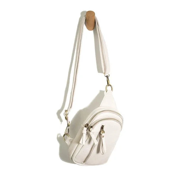 White leather Skyler Sling Bag with shoulder strap and stylish waist design