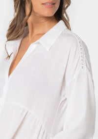 White bohemian long sleeve tiered blouse with decorative shoulder buttons