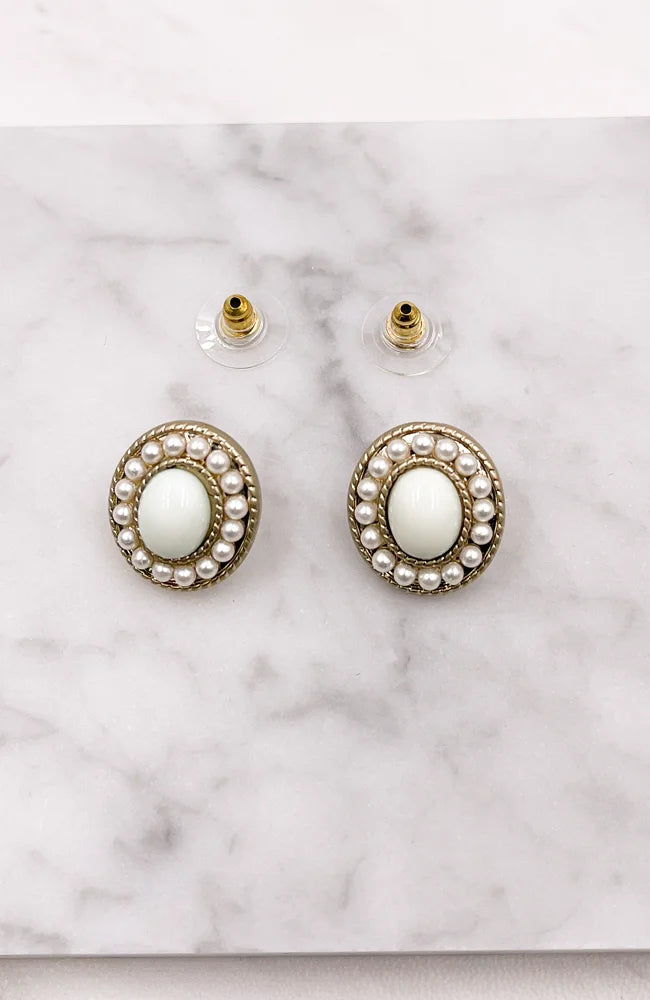 Elegant white pearl bead earrings showcased for sophisticated jewelry lovers