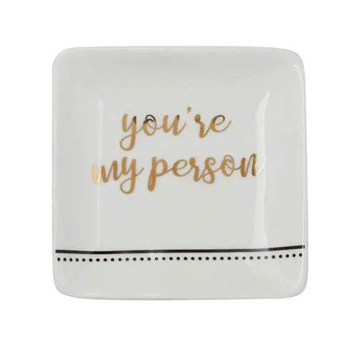 White plate with gold foil lettering saying you are on YOU’RE MY PERSON TRINKET DISH