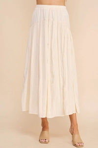 White pleated midi skirt with elastic waistband from the Flowy Crinkle Sateen collection