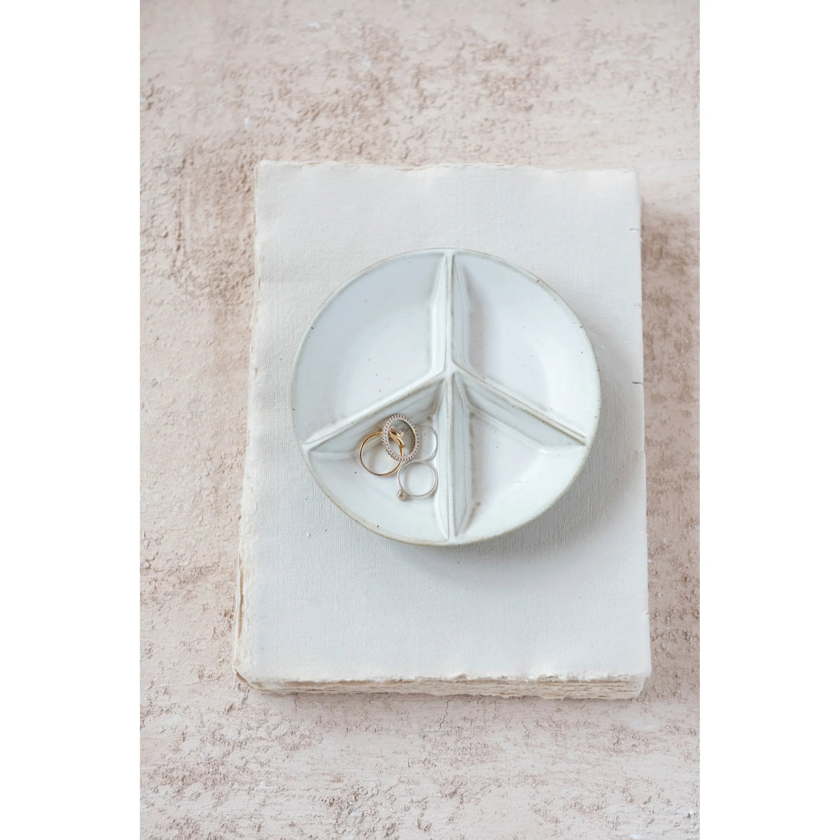 Stoneware Peace Sign divided dish featuring a white ring dish and plate on top