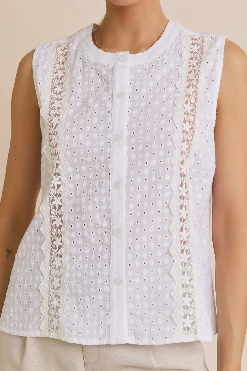 White sleeveless eyelet blouse from ROUND NECK LACE TRIM DETAIL BUTTON UP EYELET TOP, perfect for women’s boho chic clothing