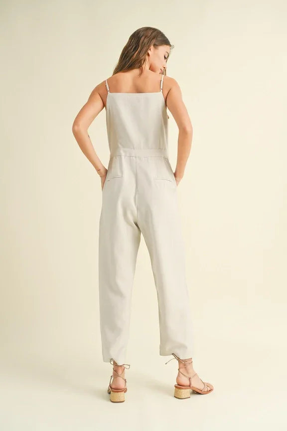 White sleeveless jumpsuit with wide-leg pants from Shop Daisy, ideal women’s boho chic clothing