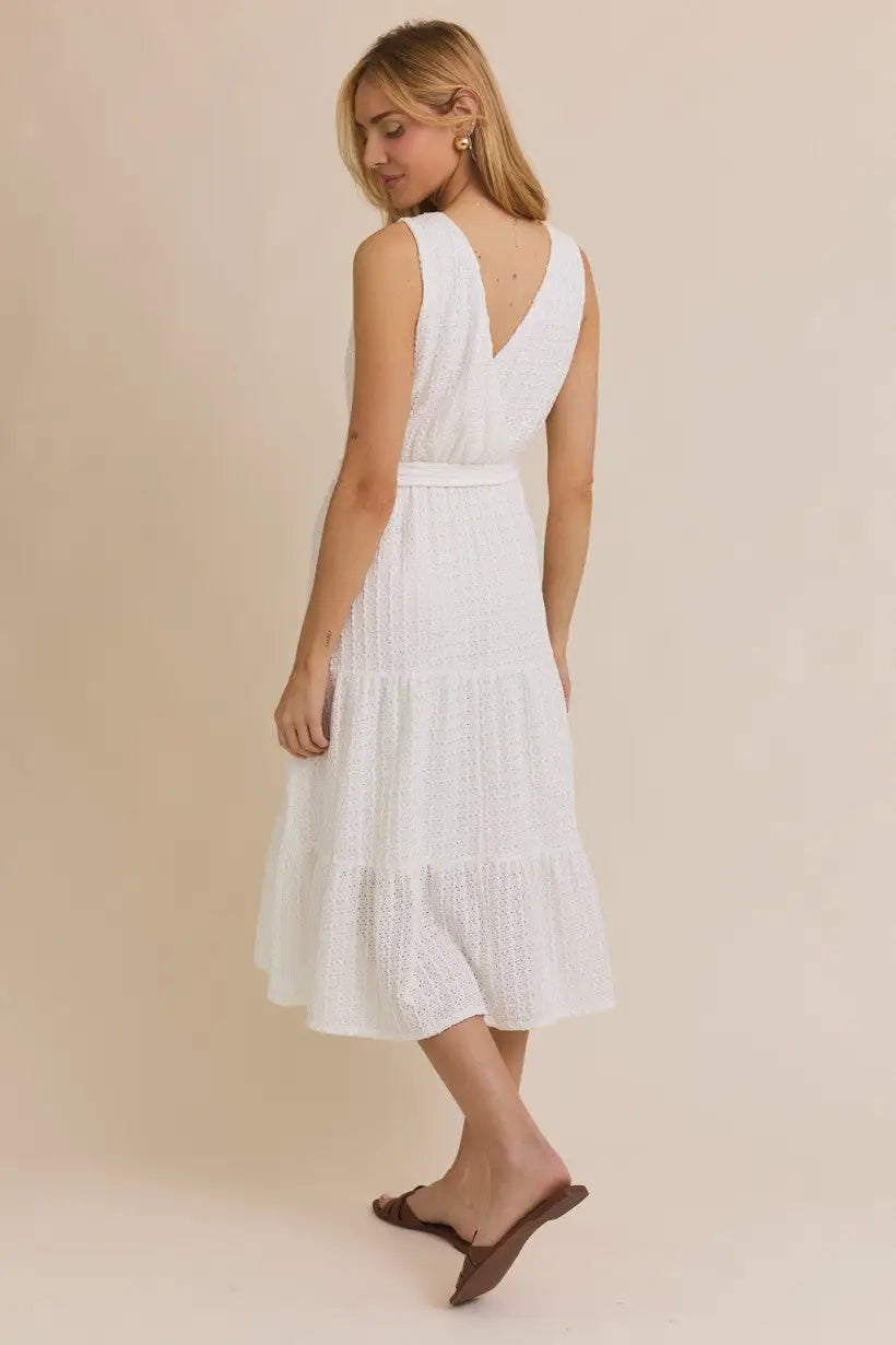 White surplice sleeveless waist tie eyelet midi dress for elegant summer wear