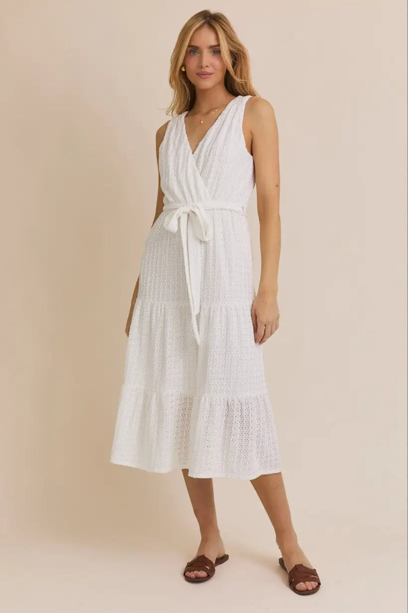 White surplice sleeveless waist tie eyelet midi dress for elegant summer occasions