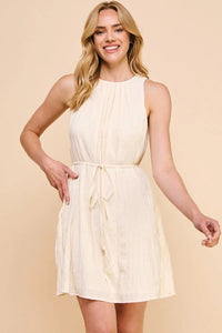 White sleeveless summer dress with tied waist in silky bamboo texture pleat design