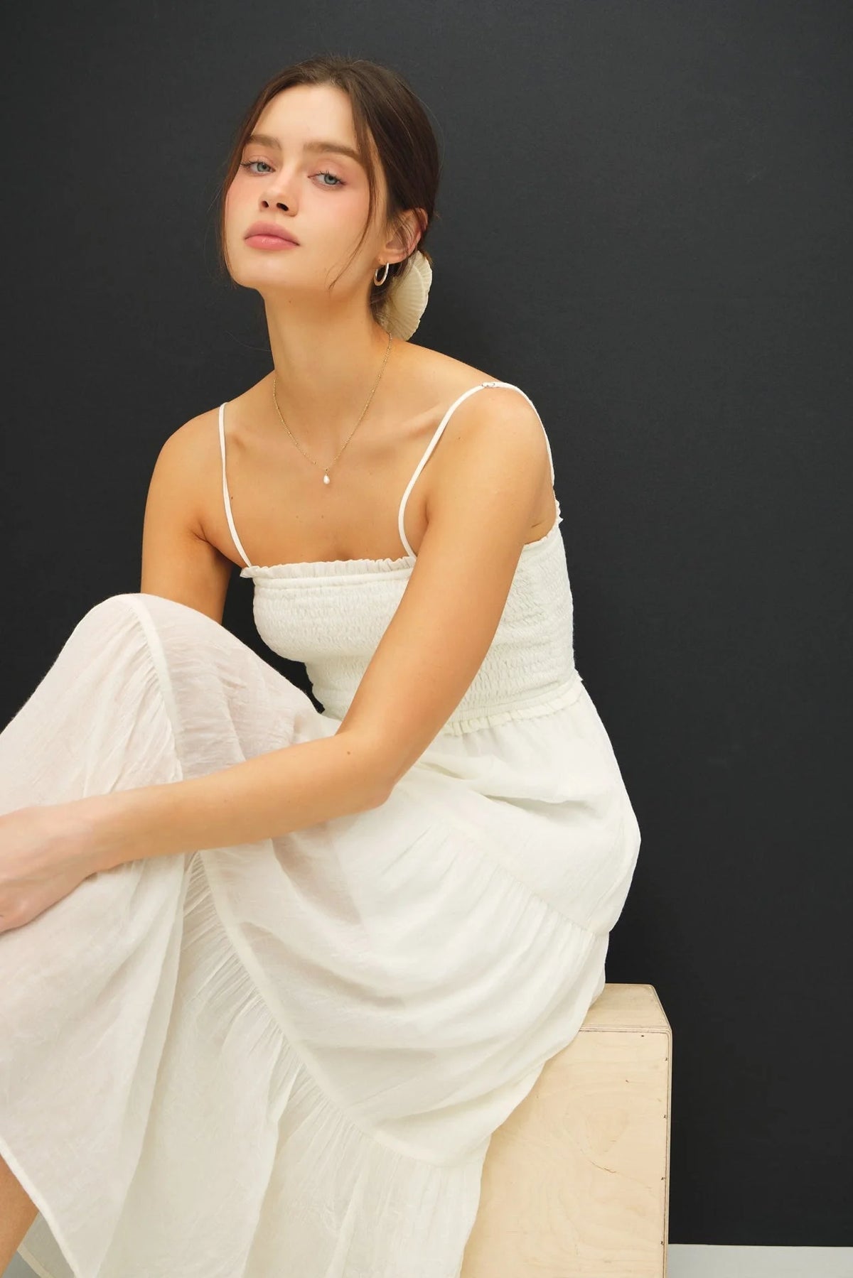 White spaghetti strap midi dress from Shop Daisy, perfect for women’s boho chic clothing