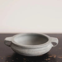White speckled soapstone bowl in gray blue slate stone with handles