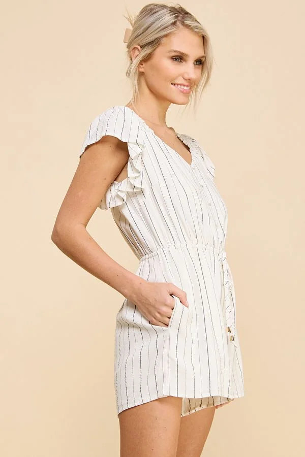 White striped romper with ruffled cap sleeves and v-neckline in textured woven design