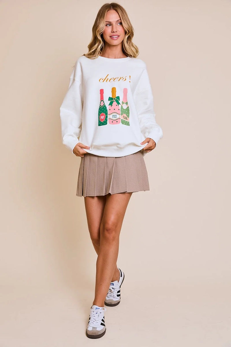 White Cheers Graphic Sweatshirt showcasing a colorful wine bottle design and the word cheers