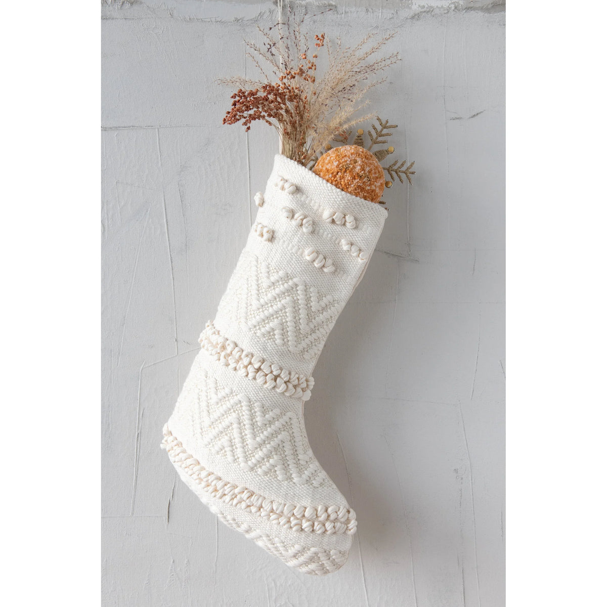 White textured Woven Cotton Blend Christmas Stocking with dried flowers and foliage