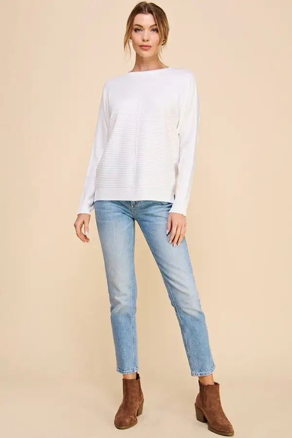 White textured knit sweater featuring soft mixed texture and a crew neckline