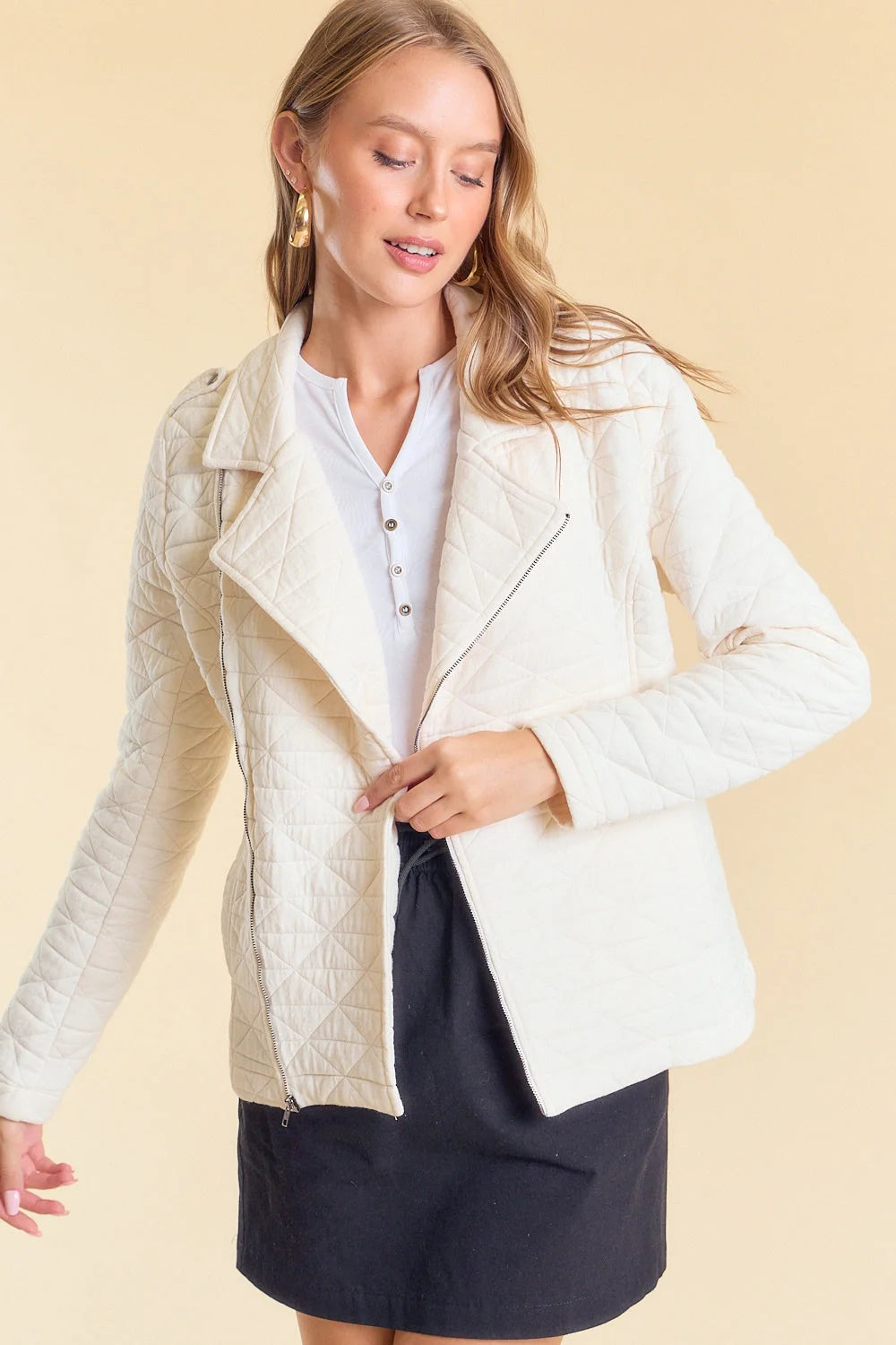 White textured washed moto jacket by Daisy Lane featuring silver hardware and lapels