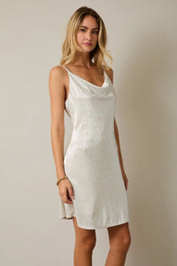 White cowl neck spaghetti strap mini dress with textured fabric