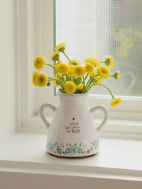 White vase with yellow flowers from ARTISAN BUD VASE - MOM, ideal for women’s boho chic clothing