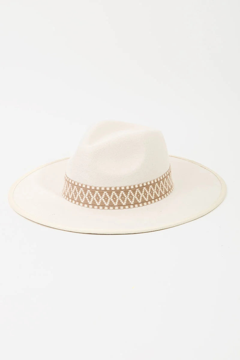 White wide-brimmed Boho Braided Band Fedora Hat with decorative tan band