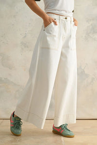 White wide-leg denim pants from STITCH DETAIL WIDE LEG PANTS, ideal for women’s boho chic clothing