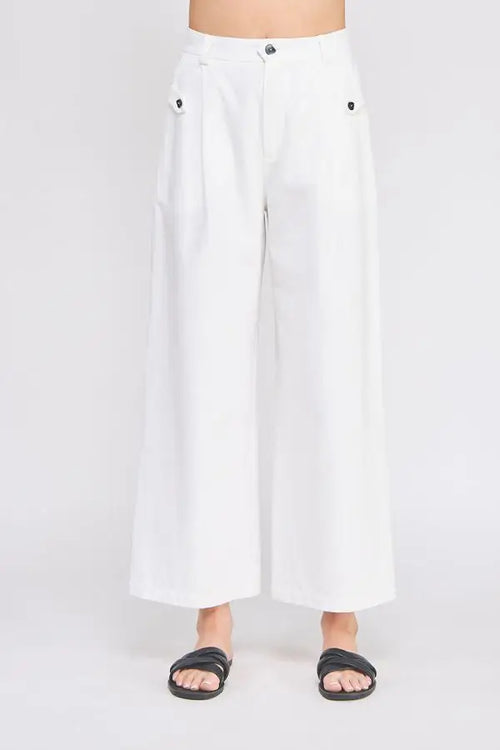White wide-leg pants with cotton elastic waist and accent buttons for a stylish look