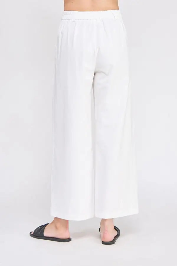 White wide-leg cotton elastic back waist pants with accent buttons and stretchy waistband