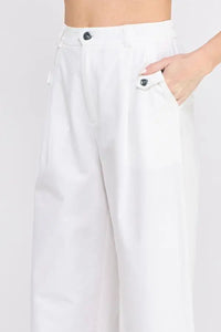 White wide-leg pants with cotton elastic stretch waistband and accent buttons