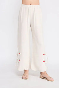 White linen elastic waist embroidered pants with cherry embroidery for a stylish look