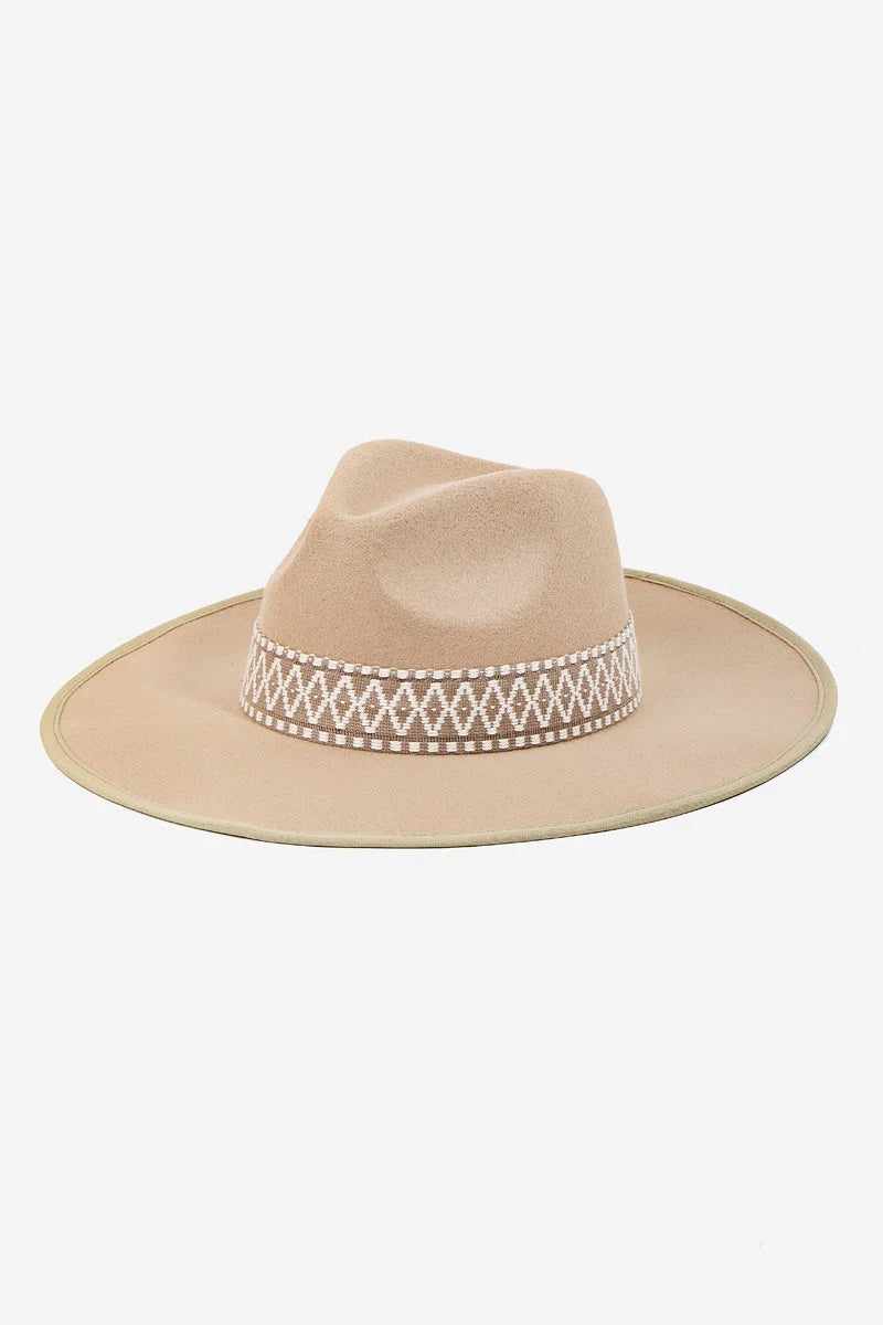 Wide-brimmed beige fedora hat with decorative boho braided band for stylish outfits