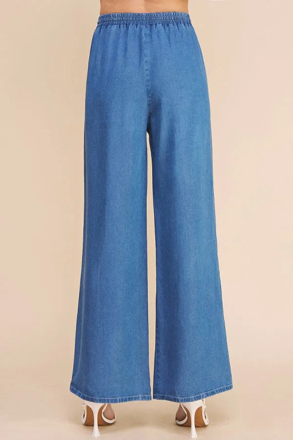 Wide-leg blue washed chambray denim pants with elastic waistband and pockets